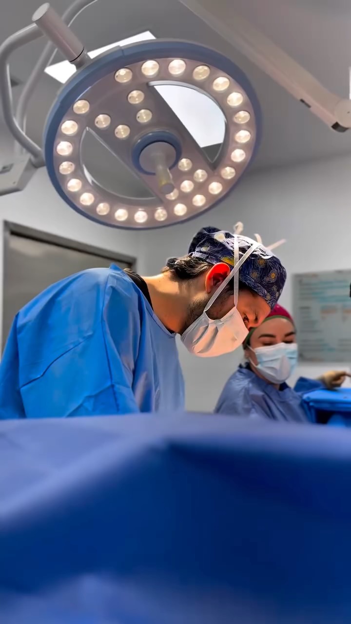 Wide low-angle view of Dr. Otero's operating room with the surgical light overhead